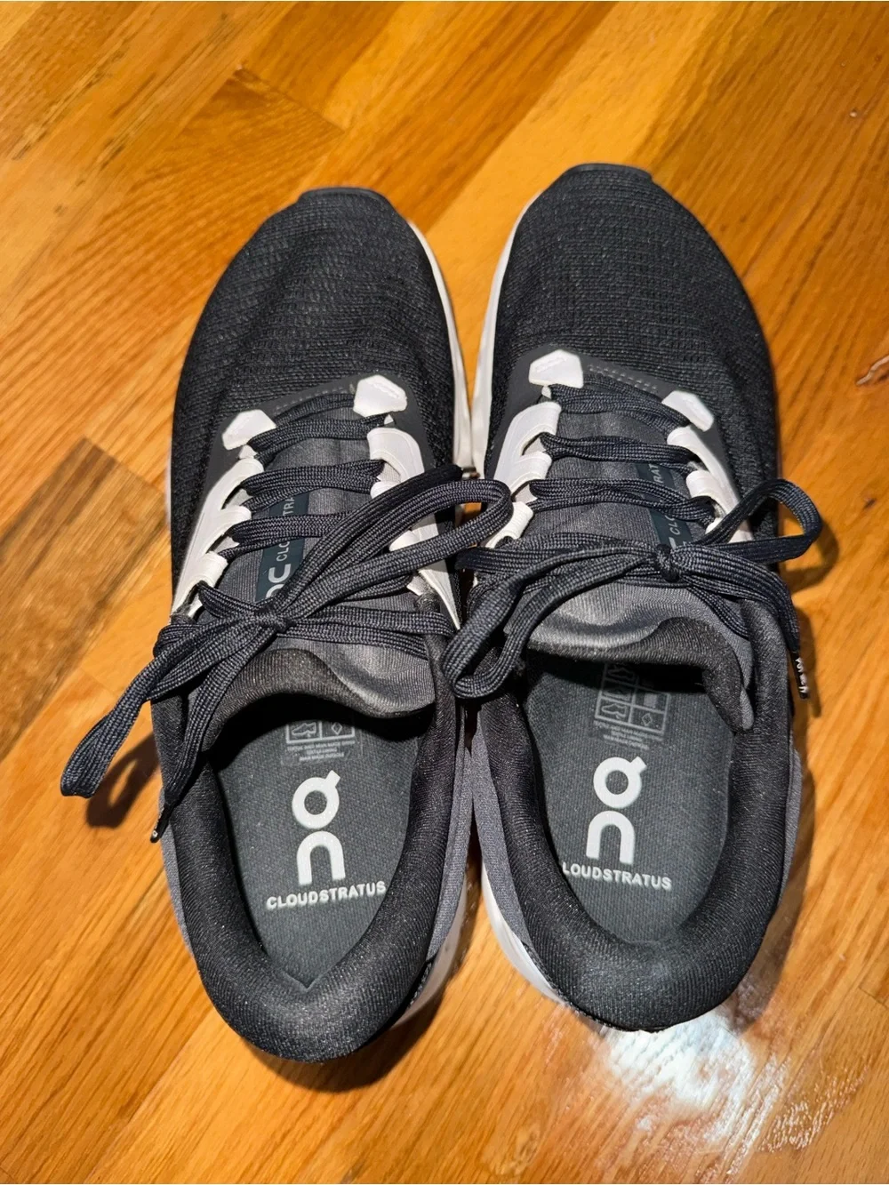 On Cloud Women's Black and White Running Sneakers